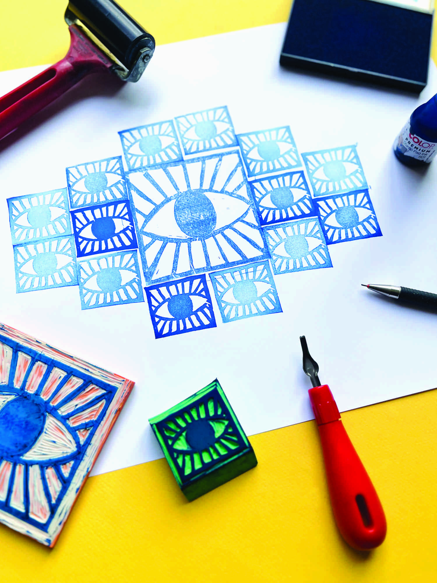 Multiple blue eye hand stamps artwork