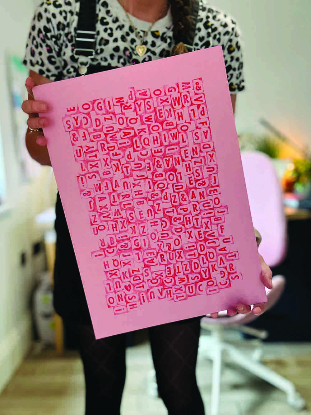 Lady Holding Pink Typography Artwork